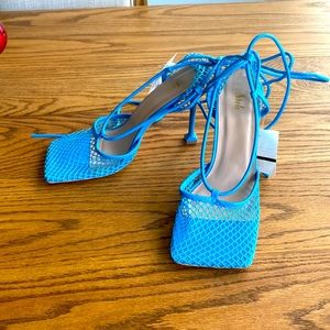 Size 10 Sheln high heels, worn my Niki Minaj and Rihanna